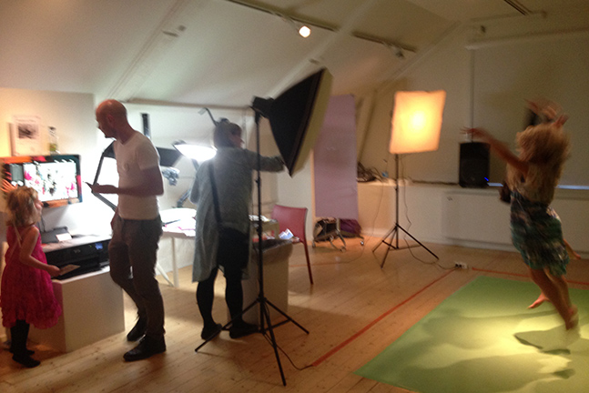 Visitors creating a collage