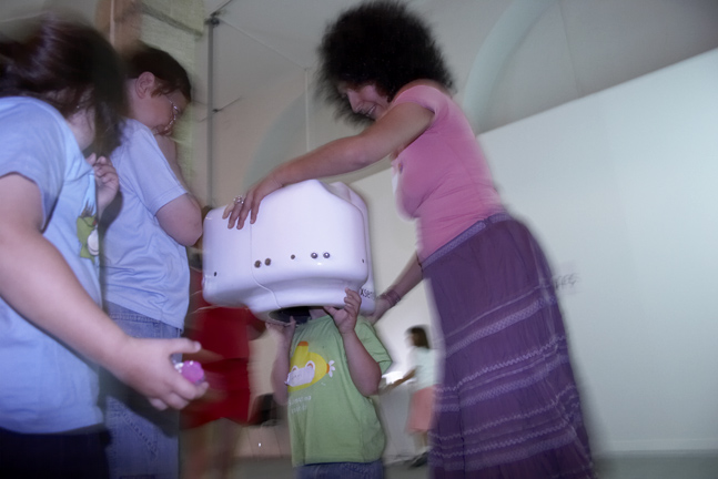 Kids trying the XSense experience at Centro Cultural Conde Duque, Madrid